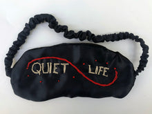 Load image into Gallery viewer, Hand-sewn and embroidered &#39;Quiet Life&#39; sleep mask in dark blue silk satin
